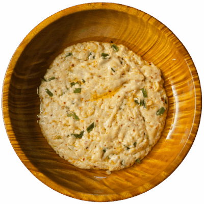 Datshi Zhimsey - Scrambled local bhutanese cheese with chili flakes and butter