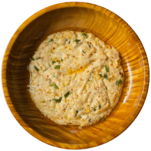 Datshi Zhimsey - Scrambled local bhutanese cheese with chili flakes and butter