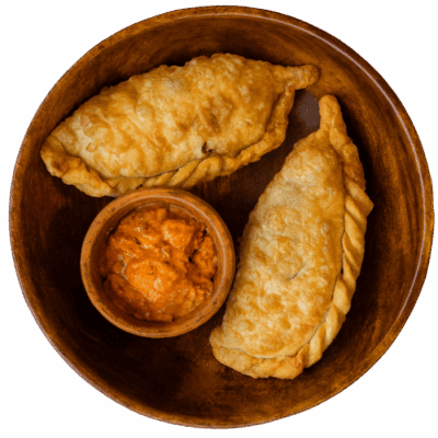 Green Chilli Ema Datshi Shapaley - Bhutanese fried pies stuffed with green chilli ema datshi filling Bhutan Kitchen Bangkok Menu item