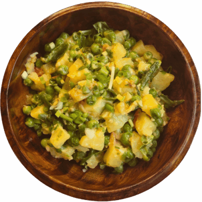 Kewa Baysem Datshi - Potato and green peas with cheese, onion and tomato - Bhutan Kitchen Bangkok