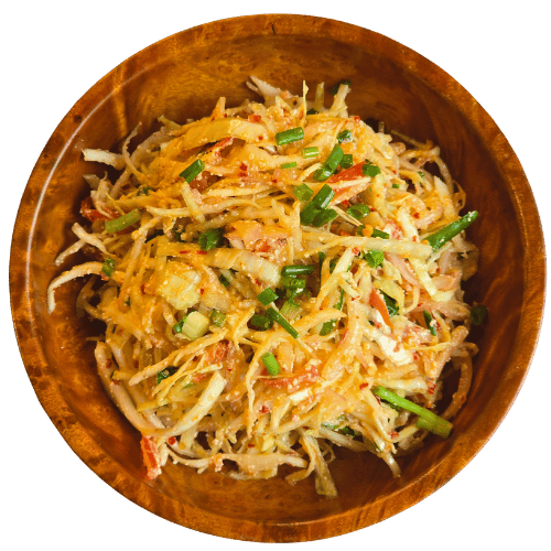 Kopi Hogay - Bhutanese Cabbage salad mixed with chili flakes, coriander, and cheese Bhutan Kitchen Menu item