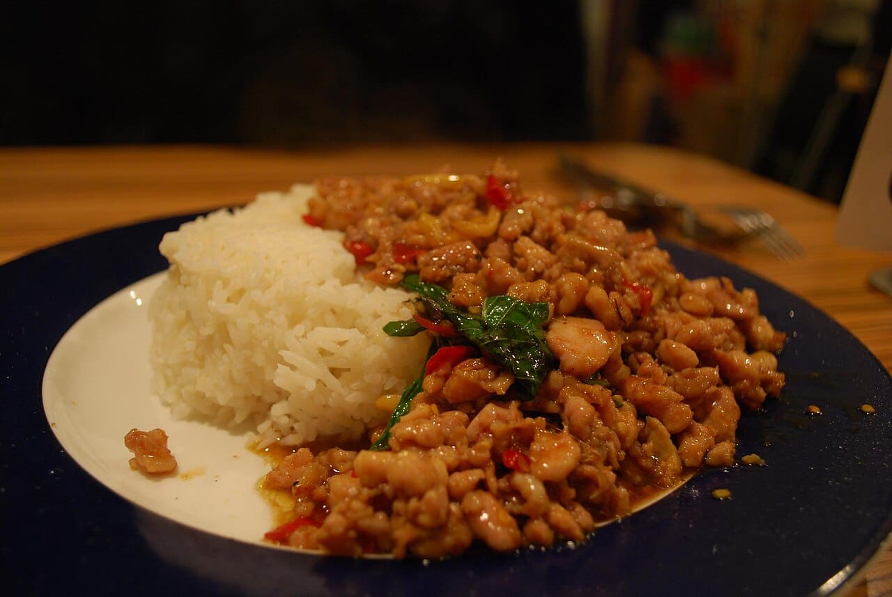 Thai Pad Krapow gai — chicken stir fried with holy basil and chilies in a wok